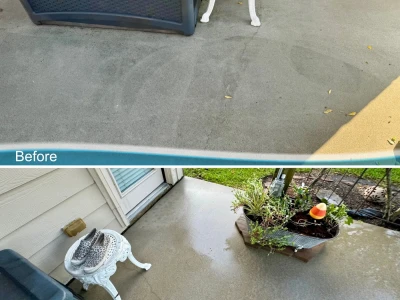 Second view before-after of back patio concrete cleaning at Westover Park in League City, TX