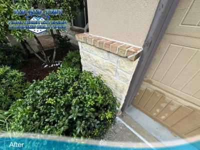 After photo of stone brick home softwash cleaning in Pearland Highland Glen