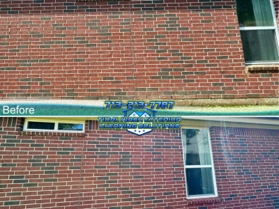 Before-and-after brick house washing for visible organic growth on a League City home.