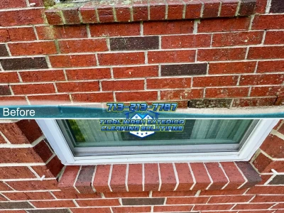 Before-and-after brick exterior cleaning around a window affected by organic growth in League City.