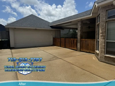 Residential wood fence after soft washing and restoration sealer application in Pearland
